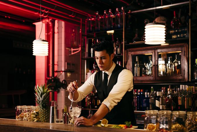 Barman working making drinks