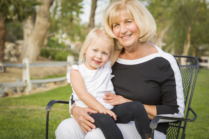 Grandmother and Granddaughter Playing At The Park