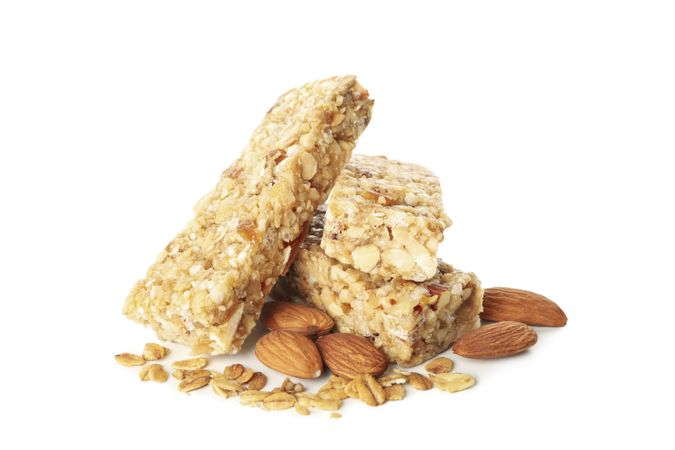 Tasty granola bars isolated on blank background