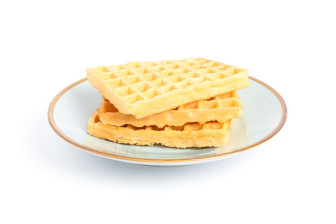 Waffles on plate isolated on blank background
