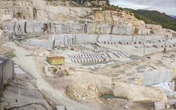 Block and heavy machinery in quarry