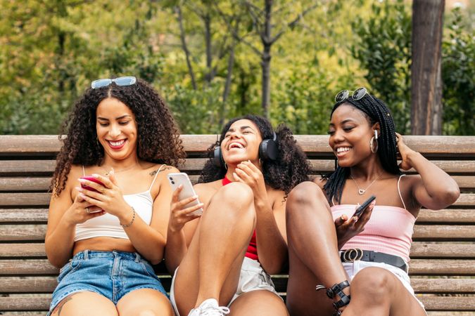 Black Friends Enjoying Summer Together and listening to music