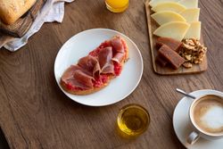 Stylish serving dishes with sandwich for breakfast