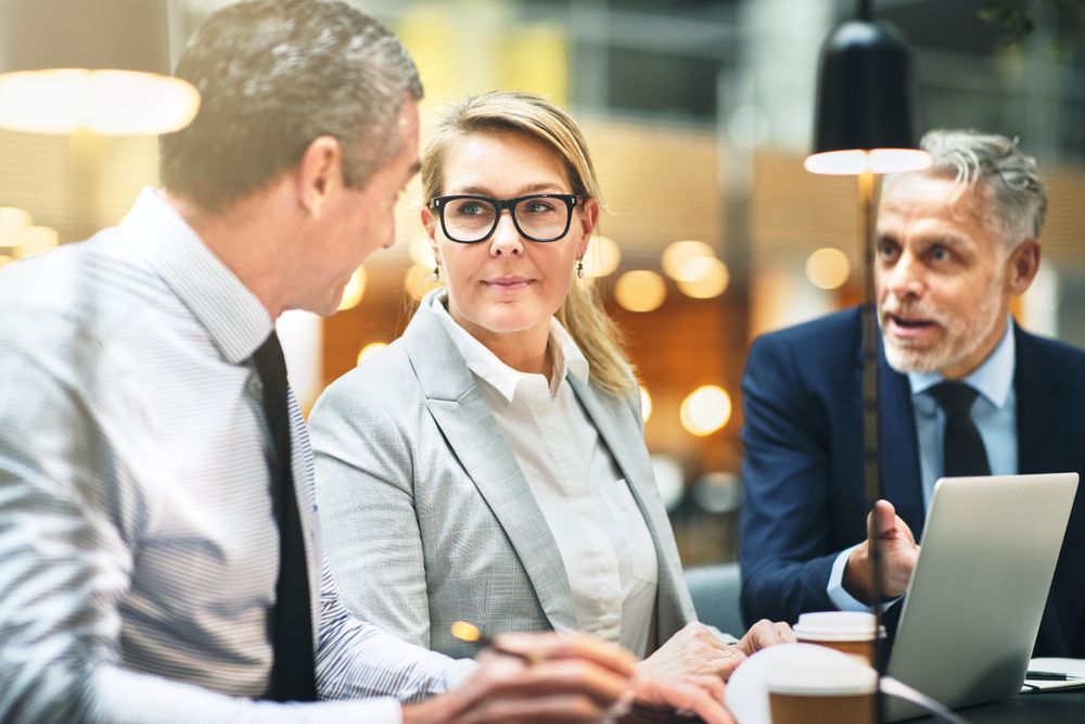 Professionals having a discussing during a meeting