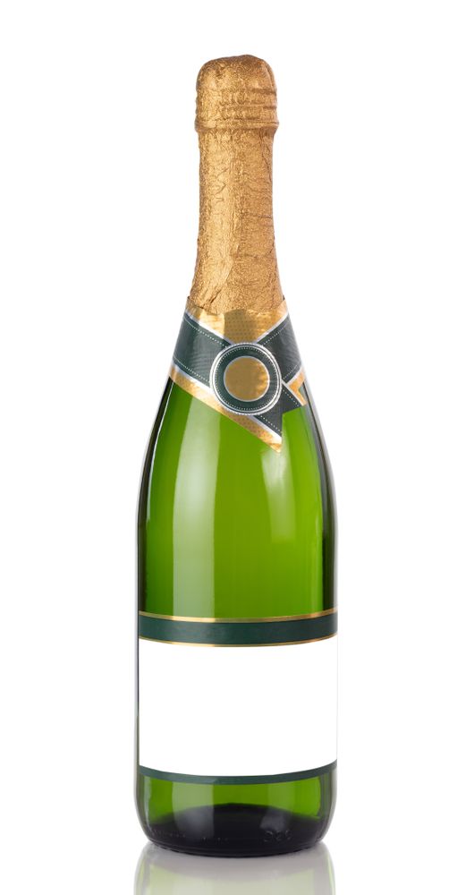 bottle of Champagne isolated on a plain background with reflection in close up view