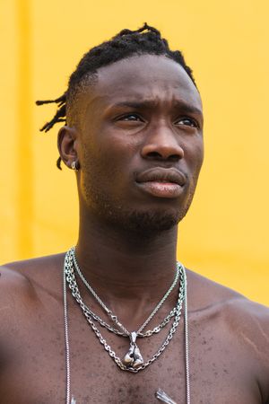 Stylish shirtless Black man