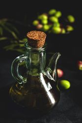 Fresh Spanish extra virgin olive oil with olives