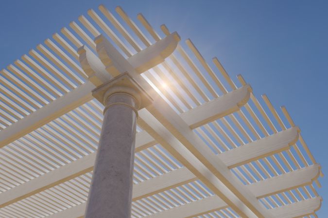 Detail Abstract of A Beautiful Marble and Wood Pergola Patio Cover.