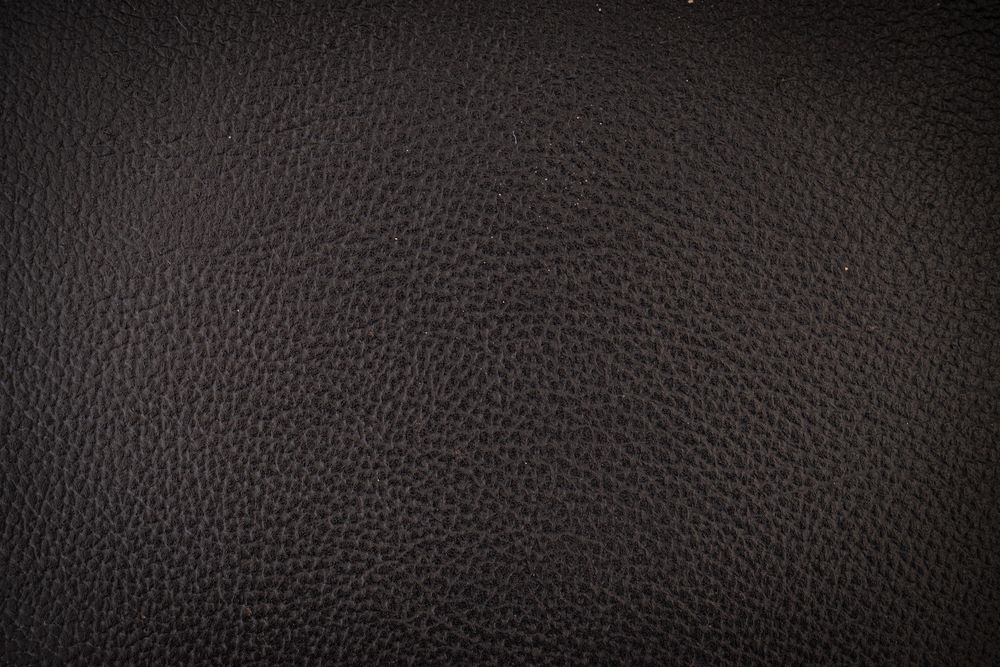 Close up dark leather background