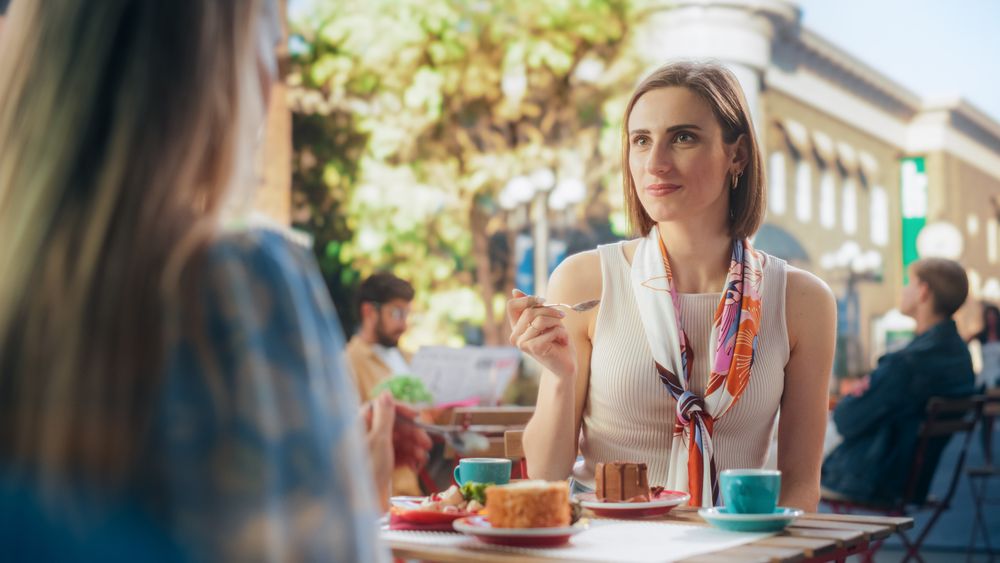 Female Trying a Slice of a Tasty Chocolate Cake, Closing Her Eyes and Smile with Satisfaction