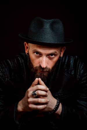 Young bearded guy in leather jacket