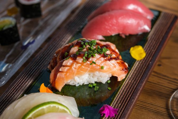 Yummy nigiri sushi with raw salmon and tuna