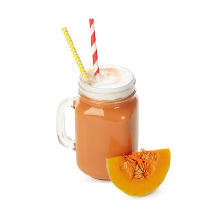 Glass jar of pumpkin latte isolated on neutral background