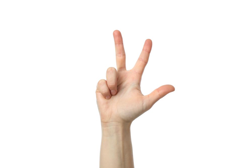 Female hand showing three fingers, isolated on blank background