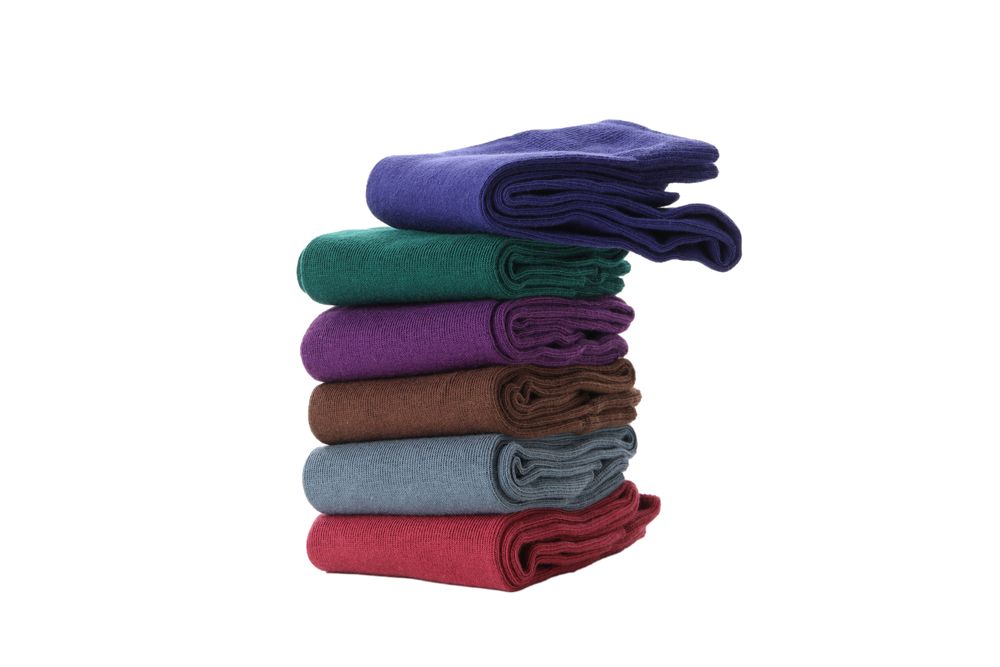 multicolored socks, isolated on light background.