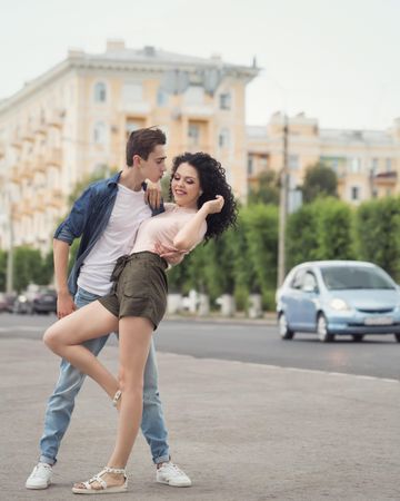 Happy teenagers on the street during a date