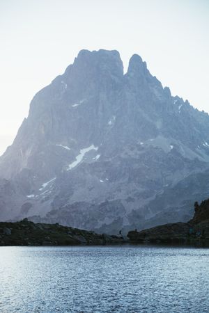 Majestic mountain landscape with human silhouette