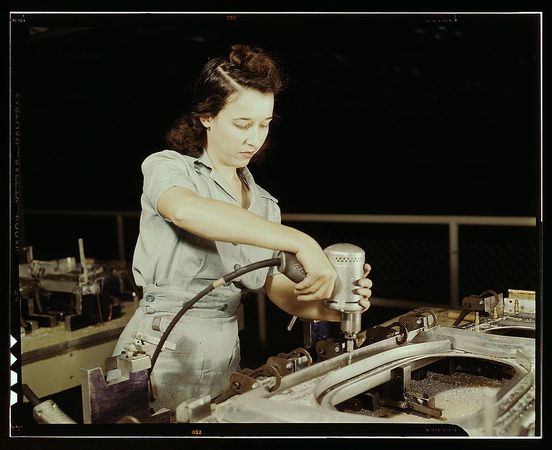 Fort Worth, TX, USA - 1942: Drilling a wing bulkhead for a transport plane