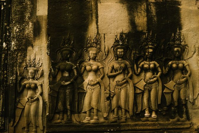 Facade of old building with ornamented women