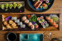 Traditional sushi rolls on table