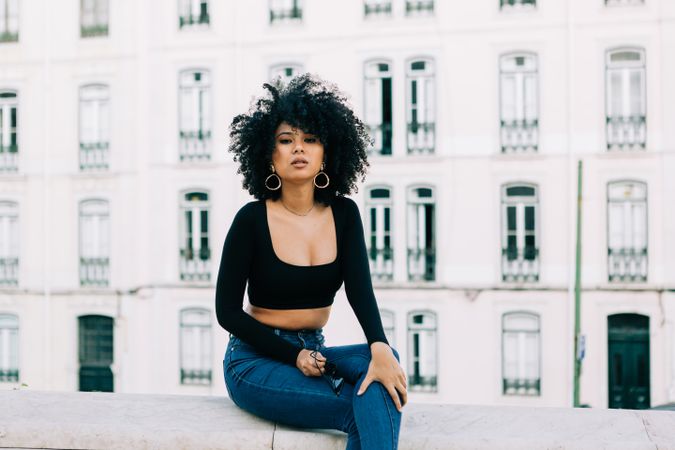 Fashionable female relaxing in city