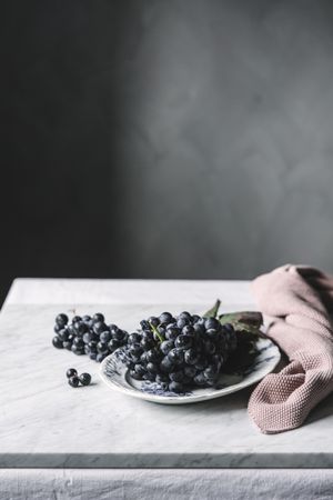 Bunch of grapes on plate