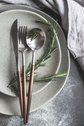 Table setting with fresh rosemary