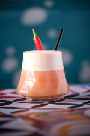 Delicious cocktail with chili pepper