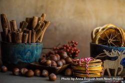 Side view of Christmas food concept or dried slices, nuts and cinnamon 43NVP5
