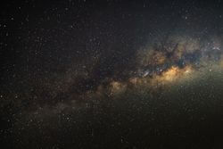 Milky way on a night sky, Long exposure photograph, with grain