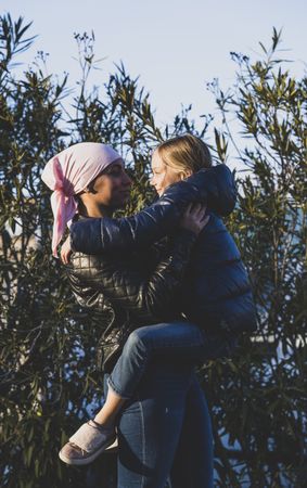 Woman and girl with cancer headwrap
