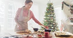 Cinematic Shot of Beautiful Woman Preparing the Dough to Make Gingerbread For the Holiday Season.