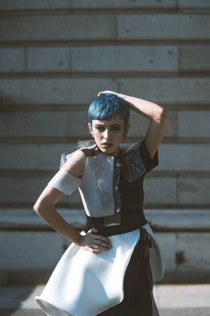 Expressive model in alternative dress on street