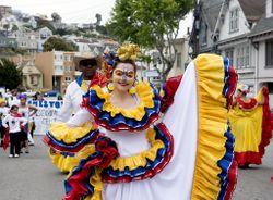 Woman in dress in Hispanic attire at Carnaval in San Francisco