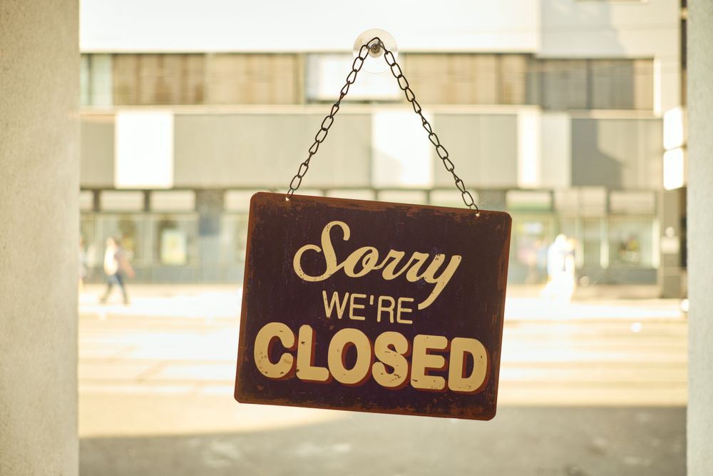 Close sign at small business window
