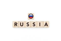 Wooden blocks bearing the name and flag of Russia.