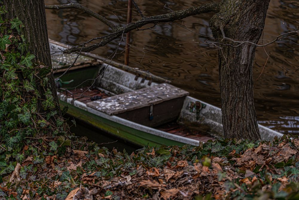 Old wooden boat in Vltava river