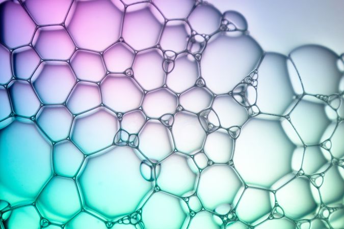 Abstract background bio technology, macro photography foam and water with gradient background. Molecule multicolor backgorund