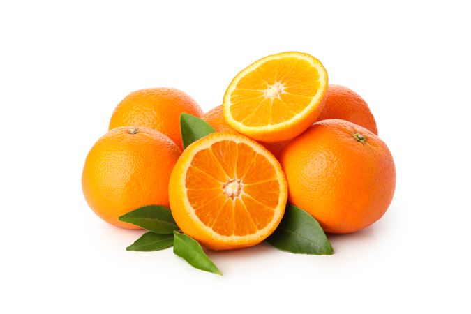 Group of ripe mandarins isolated on light background