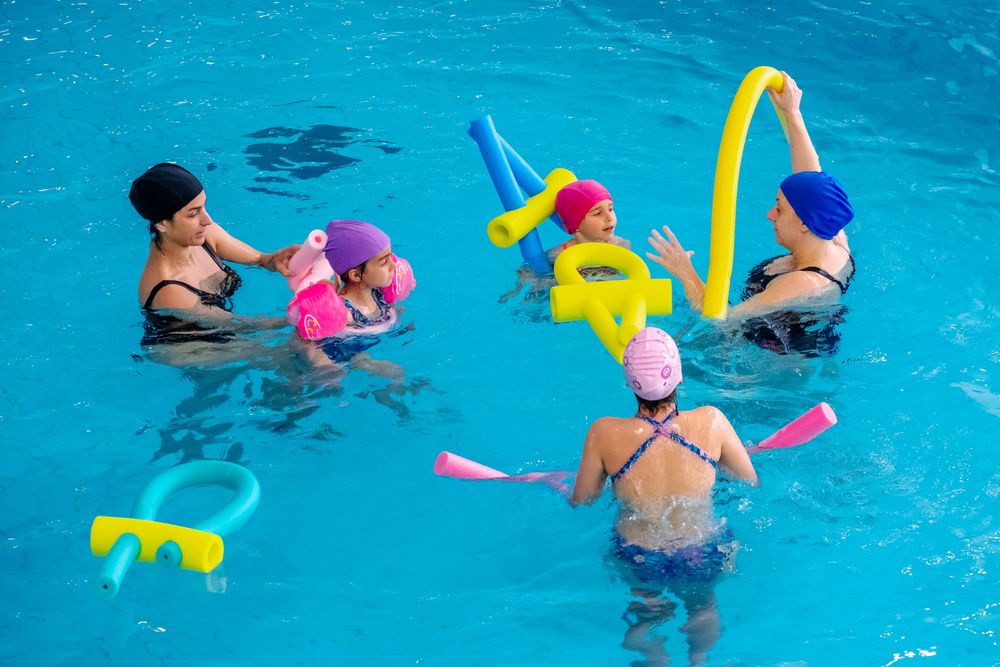 Women and girls in swimming pool