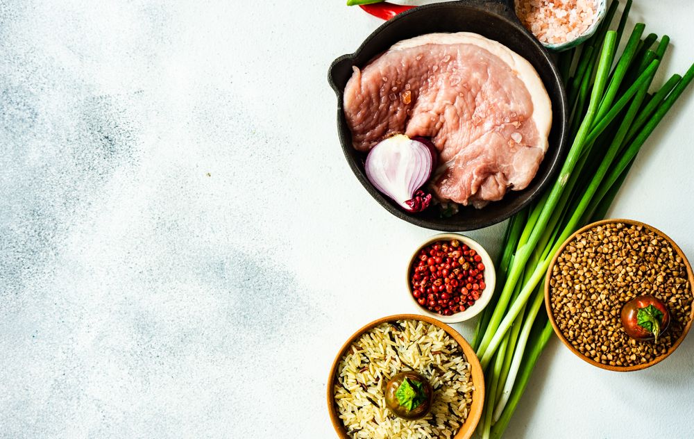 Pork cutlets with grains and green onions to cook for dinner