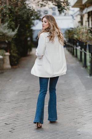 Charming woman posing on street