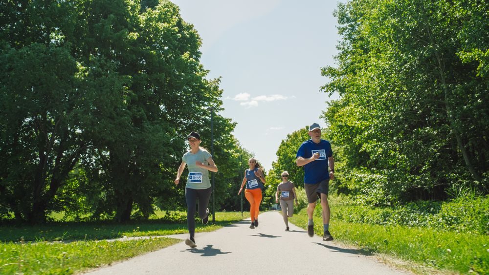 Joggers Giving their Best to Achieve the Finish Line in a Friendly Race