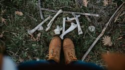 Standing person and chicken bones