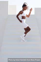 Fit woman working out on stairs 5o8zk4