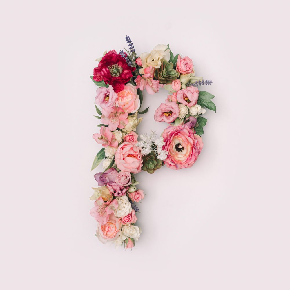 Letter P made of real natural flowers and leaves