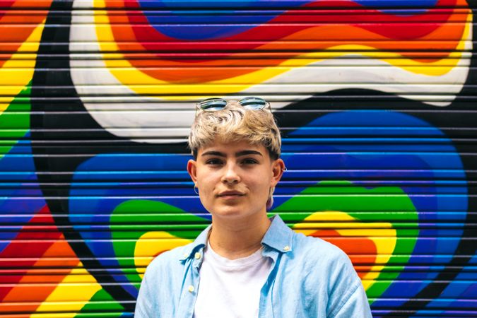 serious young woman portrait on a colorful background