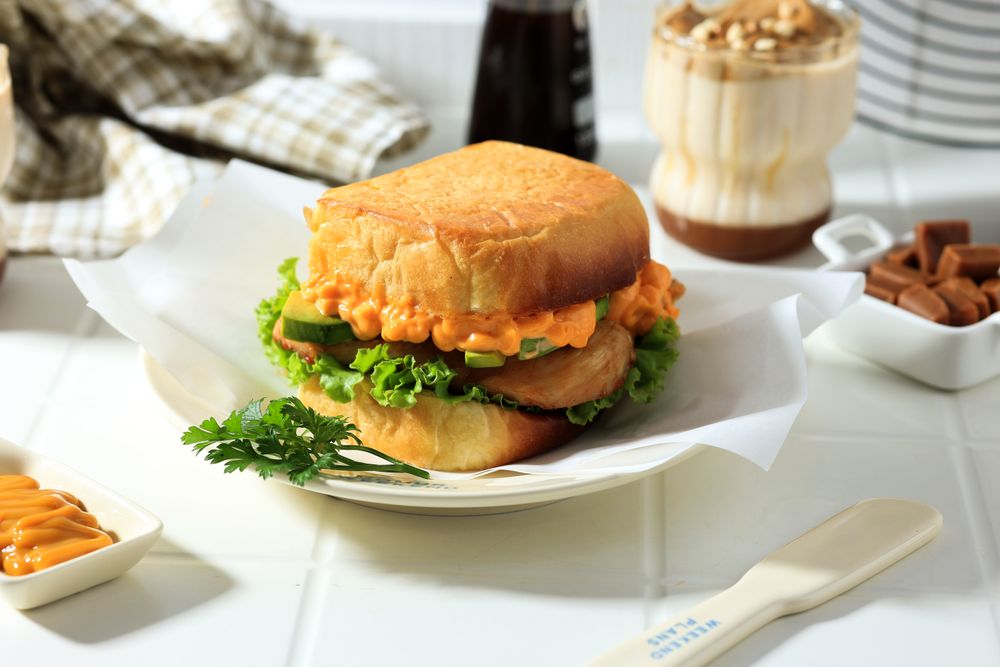 Sandwich with Chicken, Avocado, Cheese Sauce, and Lettuce