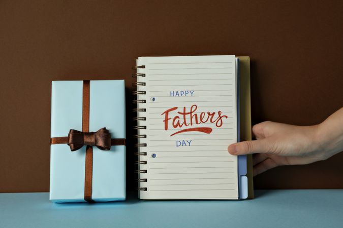 Happy father's day inscription, inscription in notebook, with gifts.