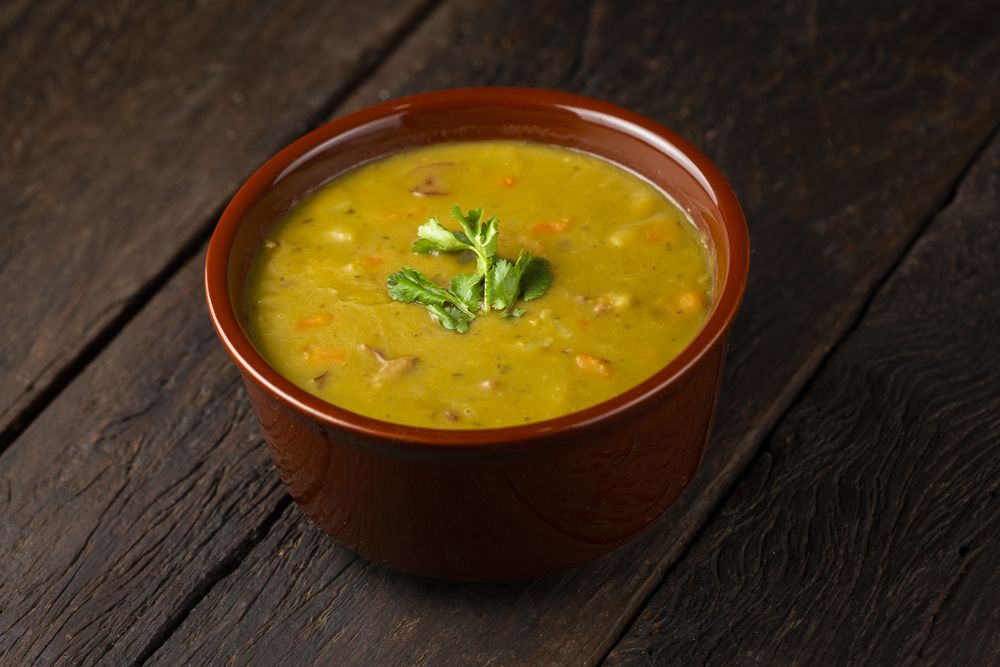 Pea soup. Bowl with pea soup on the table